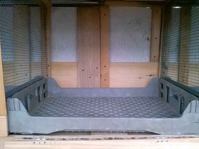 The floors for each compartment are some bread trays (trays that bread came to our store on, when I was a kid).  These were still hanging out in a storage building we own. 